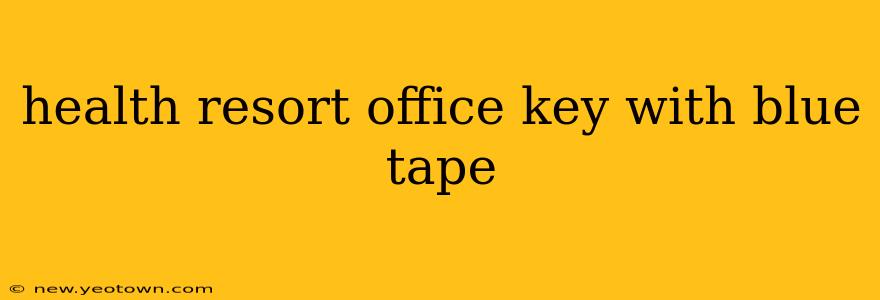 health resort office key with blue tape